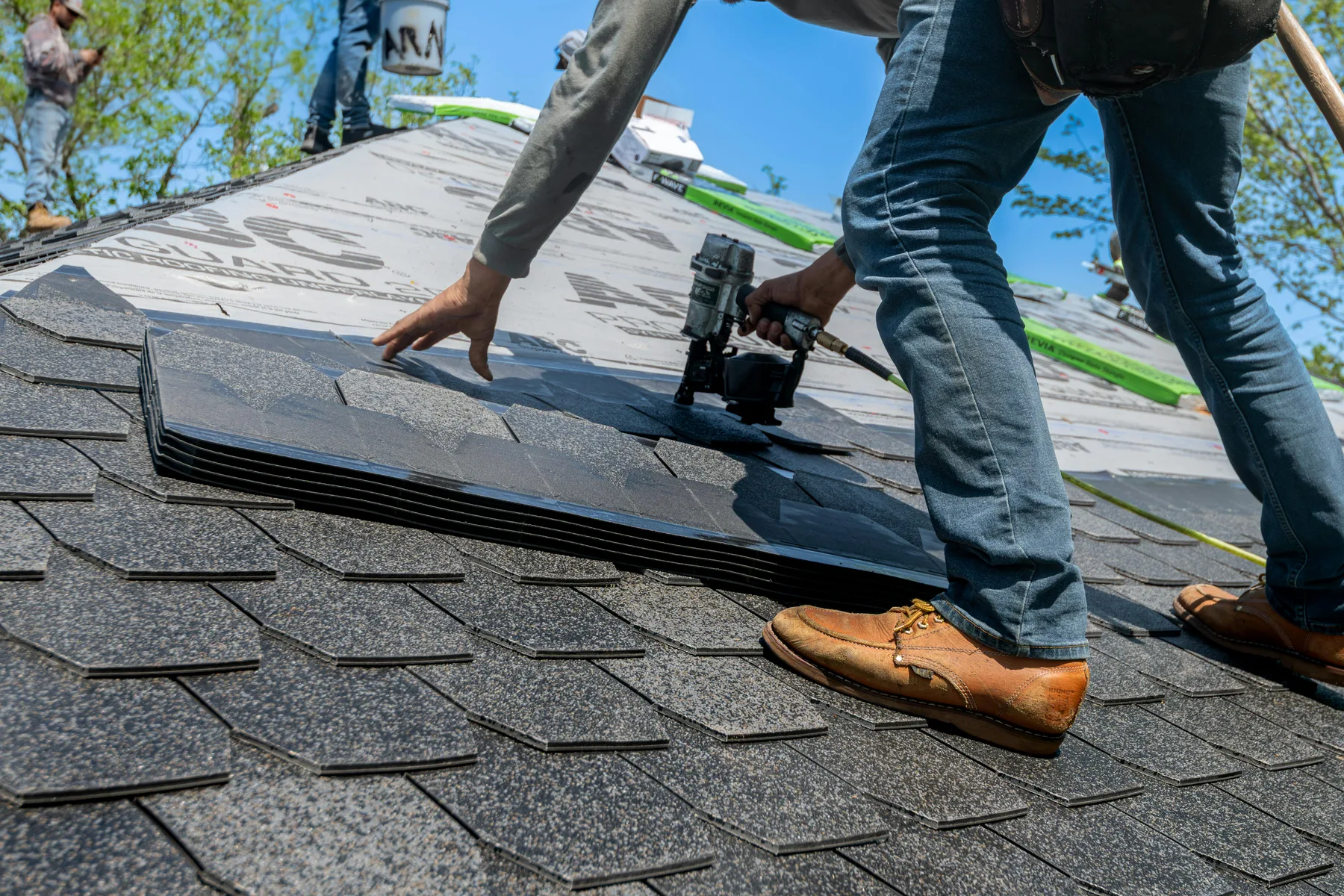 Residential roof replacement work in progress